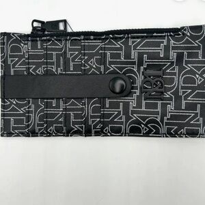 NWT Badgley Mischka black & white vegan leather credit card holder with a tab.